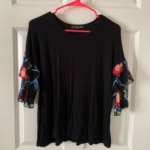 Black shirt with floral sleeves